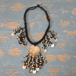 Artisan Black and Cream Beaded Necklace With Shell Accents
